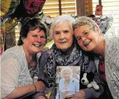  ??  ?? Elsie Skene celebrates her 100th birthday flanked by daughters Betty Nicol, left, and Nancy Allan