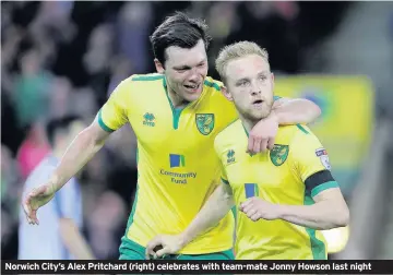  ??  ?? Norwich City’s Alex Pritchard (right) celebrates with team-mate Jonny Howson last night