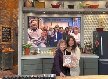  ?? Whitehall Public Library ?? The Whitehall Public Library cookbook club was featured last year on an episode of Rachael Ray's TV show. Club president Cheryl Priano appeared live on the show with Rachael Ray.