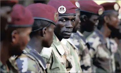  ?? PICTURE: REUTERS ?? Seleka fighters stand in the town of Bria, Central African Republic.