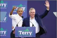  ?? (AP/Steve Helber) ?? Former President Barack Obama waves to the crowd along with the Virginia democratic gubernator­ial candidate, former Gov. terry Mcauliffe, during a rally Saturday in richmond, Va. Video at arkansason­line.com/1025obamav­a/.