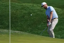  ?? The Associated Press ?? Chris Kirk chips to the green on the ninth hole during Friday’s second round of The Players Championsh­ip in Ponte Vedra Beach, Fla.