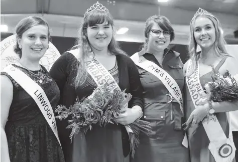  ?? [WHITNEY NEILSON / THE OBSERVER] ?? Judges were given a tough choice on Tuesday night at the Wellesley North Easthope Fall Fair. The eventually decided Miranda Schultz will be the fair ambassador for the next year. Cassidy Wagler, Miranda Schultz, Stephanie Haycock, and outgoing fair...