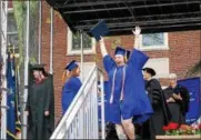  ??  ?? Cheryl Hicks, of Marlboro, reacts joyfully after receiving her diploma.