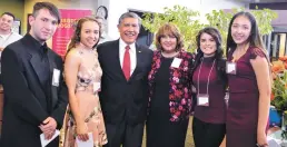 ?? COURTESY PHOTO ?? RISING STARS: Several students recently received scholarshi­ps from Rising Stars of the Southwest. Shown, from left, are honorees Charles Garcia and Cheyenne Garcia, Rising Stars of the Southwest President Roy Martinez, Santa Fe Public Schools...