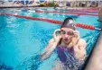  ??  ?? Kaitlin Bennett of Los Alamos, 17, adjusts her goggles during a recent training session.