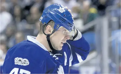  ?? THE CANADIAN PRESS FILES ?? Toronto took eight penalties in its season-opening victory over the Winnipeg Jets, including one for Leo Komarov’s askew visor.