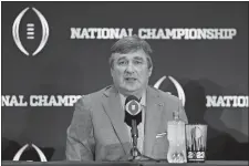  ?? ASHLEY LANDIS/AP PHOTO ?? In this Jan. 10 file photo, Georgia head coach Kirby Smart speaks to reporters during a press conference the day after winning the College Football Playoff final against TCU in Los Angeles.