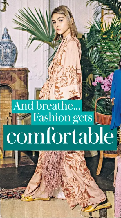  ??  ?? Chic comfort: left, Johanna Ortiz’s deluxe kimonos; below, from top, Christian Dior’s gown with trainers, Balenciaga’s cobalt maxi, Valentino’s feather dusting, Alexa Chung wears plimsolls with lace and Stella Mccartney’s fluid tailoring