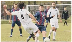  ??  ?? ‘PROUD’
Callum Glen battles for possession against Binfield