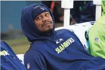  ?? JOE NICHOLSON, USA TODAY SPORTS ?? Seahawks running back Marshawn Lynch, above, and Lions wide receiver Calvin Johnson are contemplat­ing retirement.