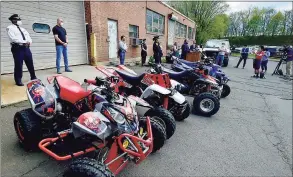  ?? Peter Hvizdak / Hearst Connecticu­t Media ?? In this photo from May 20, Assistant Chief Karl Jacobson speaks at podium, right, during a New Haven Police Department press conference announcing all terrain vehicle and dirt bike enforcemen­t.