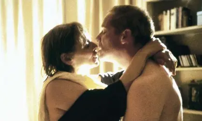  ??  ?? Louise Goodall and Peter Mullan embrace in My Name Is Joe. Photograph: Allstar/Channel Four Films