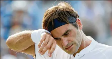  ?? ROB CARR / GETTY IMAGES ?? Roger Federer is looking to win a men’s-record 21st Grand Slam title, and a sixth U.S. Open championsh­ip would break a tie with Jimmy Connors and Pete Sampras for the most in the profession­al era.