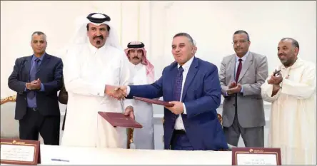  ??  ?? . QC first vice-chairman Mohamed bin Ahmed bin Towar and head of the Moroccan Chamber for Handicraft­s in Souss-Massa region, Affane Ben Bouaida, after signing the agreement.