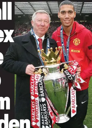  ??  ?? Winners: Ferguson and Smalling after the Premier League title was clinched in 2013