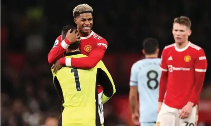  ?? Photograph: Naomi Baker/Getty Images ?? As the final whistle blew Marcus Rashford was grabbed by David de Gea, who hoisted him into the air and wheeled him around with genuine affection.