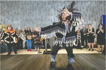  ?? DARREN STONE ?? Phillip George of Leguamin Dance Group performs on Friday at a funding announceme­nt for the new Royal British Columbia Museum in Victoria.