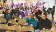  ?? Meghan Friedmann / Hearst Connecticu­t Media ?? Members of 32BJ SEIU, a union of Connecticu­t building cleaners, voted Saturday in New Haven to authorize a strike if their demands were not met in contract negotiatio­ns. Some 450 additional workers voted to authorize the strike at a separate meeting in Hartford, and a vote in Stamford was scheduled for later in the day.