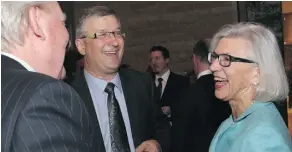  ??  ?? Supreme Court of Canada Chief Justice Beverley McLachlin enjoys a laugh with lawyers Greg Kane, left, and Randy Marusyk, at Ottawa City Hall on Tuesday. McLachlin spoke fondly of her early days in Ottawa, where she found the citizens and her neighbours...
