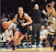  ?? AJ Mast / Associated Press ?? UConn’s Caroline Ducharme drives during a game against Butler in Indianapol­is. The Huskies’ game against Butler scheduled for Friday was canceled due to weather.