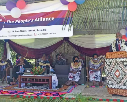  ?? ?? Tui Nadi Ratu Vuniyani Navuniuci (standing right), addresses the crowd that gathered during the launch of Sitiveni Rabuka’s party, The People’s Alliance, at Nawaka Village, Nadi on October 11, 2021.