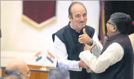  ?? ARVIND YADAV/HT ?? Union minister Ravi Shankar Prasad with Congress leader Ghulam Nabi Azad at Rashtrapat­i Bhavan in New Delhi on Sunday. The main opposition party said the reshuffle reflected ‘maximum government and no governance’.