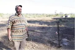  ?? Photo: Sue Maclennan ?? Totomani Skeyi at the Skelmdrift property. He says the land to his right was bulldozed.