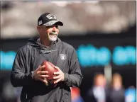  ?? Sarah Stier / Getty Images ?? Raiders coach Rich Bisaccia on the field before facing the Giants at MetLife Stadium on Sunday in East Rutherford, N.J.