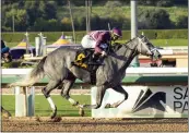  ?? BENOIT PHOTO VIA AP ?? Sweet Azteca, with Flavien Prat aboard, wins the Grade I $300,000 Beholder Mile on Saturday at Santa Anita.