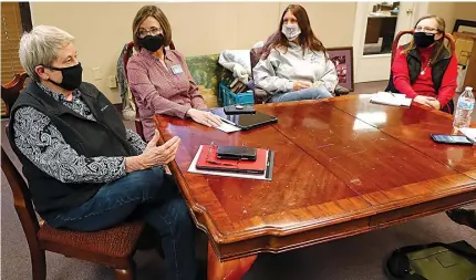  ?? The Sentinel-Record/Richard Rasmussen ?? Q
From left, Sally Carder, Kim Carter, Trish Nooner and Kathy Randel discuss sheltering the homeless on Tuesday.