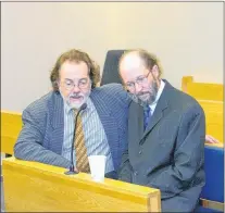  ?? ROSIE MULLALEY/THE TELEGRAM ?? Kenneth Harrisson (right) speaks with his lawyer, Bob Buckingham, prior to the start of proceeding­s in Harrisson’s trial at provincial court in St. John’s Tuesday.