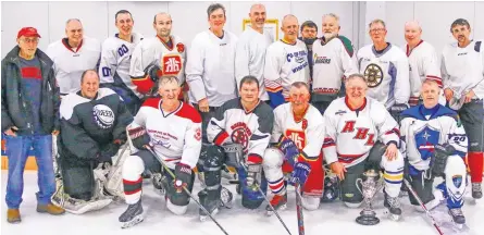  ?? JIM IVEY ?? The 2022 Hants Exhibition Arena All-Stars alumni hockey team (formerly the Windsor Regional High School Warlords) consisted of, from left, back row: Stan Kochanoff (coach), Phil Ingraham, Jim Kochanoff, George Armstrong, Greg Miller, Garby Dauphinee, Paul Redden, Craig Martin (assistant coach), Paul Beazley, Bunker Trinacity, Victor Oulton, and Chris Hebb. Front row: Larry Warren, Doug Swinamer, Troy Burgess, Dean Woodman, Jeff Burgess, and Daren Burgess