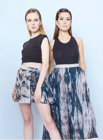  ??  ?? (Left) Laser-cut knit jersey top with mini skirt in marble-dyed print; (right) Knit tank top worn with a full silk skirt in marble-dyed print