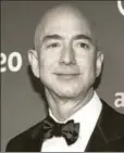  ?? REUTERS ?? Two notable Americans — Amazon CEO Jeff Bezos (left) and Virginia governor Ralph Northam — faced firestorms of criticism last week but they handled it differentl­y