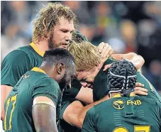  ?? /Reuters ?? Big moment: Bok flanker Pieter-Steph du Toit is overcome with emotion at the final whistle with teammates Tendai Mtawarira, RG Snyman and Cheslin Kolbe.