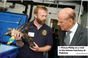  ?? Bernie Pettersen ?? > Prince Philip on a visit to the lobster hatchery at Padstow