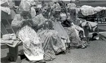  ??  ?? Five members of the Christian Community at Springbank knitting at a market day in Rangiora in 1983. They are from left, Patience, Peace, Purity, Harmony and Virtue. The girls were taught to knit at the age of 3.