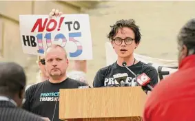  ?? Rogelio V. Solis/Associated Press ?? Cole-Finley Nelson, right, speaks at a protest of Mississipp­i House Bill 1125, which bans gender-affirming care for trans children.