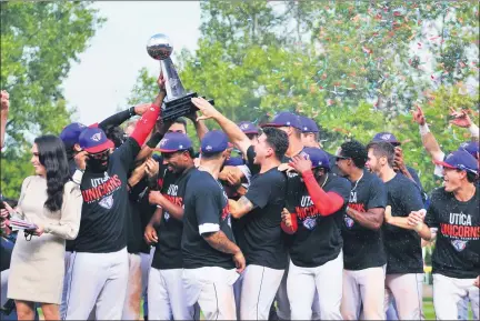  ?? PHOTOS COURTESY OF THE USPBL ?? The Utica Unicorns celebrate winning the 2020USPBL championsh­ip. It was the third time the Unicorns have won the league title.