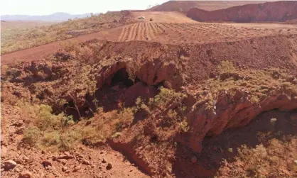  ??  ?? The Juukan Gorge site in Western Australia before Rio Tinto blasted it in May. The miner has told traditiona­l Aboriginal owners in the Pilbara it wants to work more with them to address their concerns. Photograph: PKKP Aboriginal Corporatio­n/AFP/Getty Images