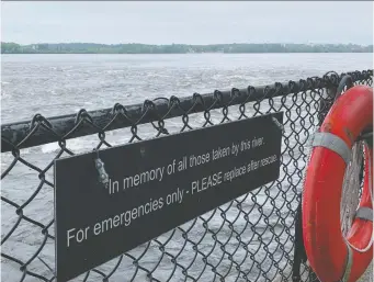  ?? KELLY EGAN ?? A sign references the succession of victims of the fast-moving Ottawa River off Bate Island.