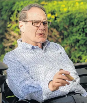  ?? AP PHOTO ?? Jerry Reinsdorf, owner of the Chicago White Sox, relaxes at the annual MLB baseball general managers’ meetings, Tuesday in Orlando, Fla.