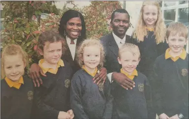  ?? ?? SWAZILAND teachers, the Rev. Abraham Gama and Mina Mkhwanazi, meeting the pupils of Jones Memorial PS: Kylie Mccabe, Aimee Morrison, Olivia Beavis, Harry Leonard, Alexandra Wilson and Adam Brownlee. 2012.