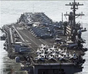  ?? — AP ?? United States: The ‘USS Carl Vinson’ participat­ing in a joint naval exercise at Busan Port last month.