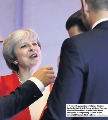  ?? Matthias Schrader ?? > From left, Luxembourg’s Prime Minister Xavier Bettel, British Prime Minister Theresa May and Slovakian Prime Minister Peter Pellegrini, at the plenary session of the informal EU summit in Salzburg