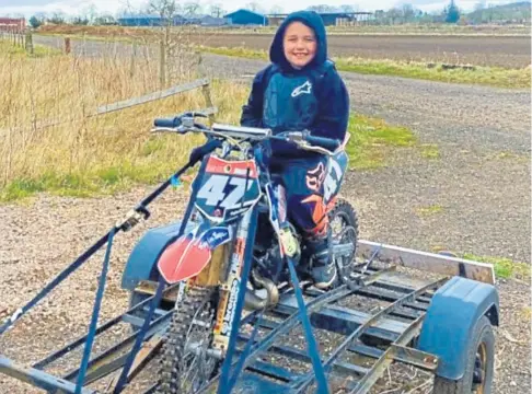  ??  ?? LOSS: Amy Briggs’ son Scott with his beloved motorcycle which has been stolen from a secure lock-up, below.