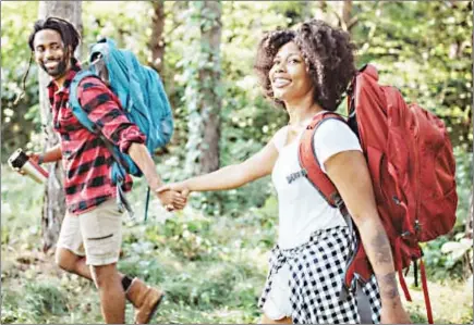  ?? (Internet pics) ?? A young couple on a getaway in countrysid­e to enjoy the last bit of summer. They are walking through the forest and exploring nature.