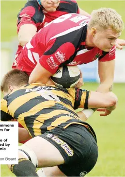  ??  ?? Right: Brad Howe of Redruth is tackled by Canterbury’s Jamie Stevens