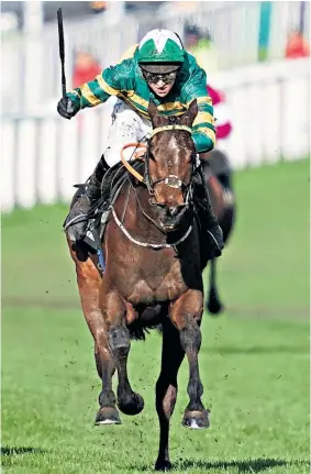  ??  ?? Final flourish: Espoir D’allen sprints for victory with Mark Walsh on board